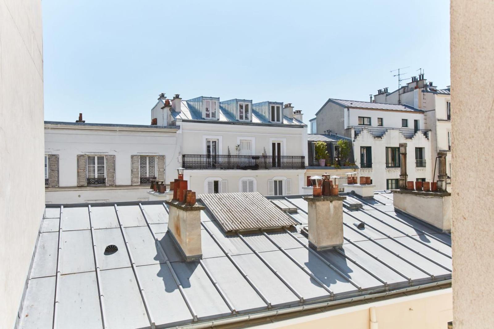 Appartamento Cosy Montmartre 2Br Parigi Esterno foto